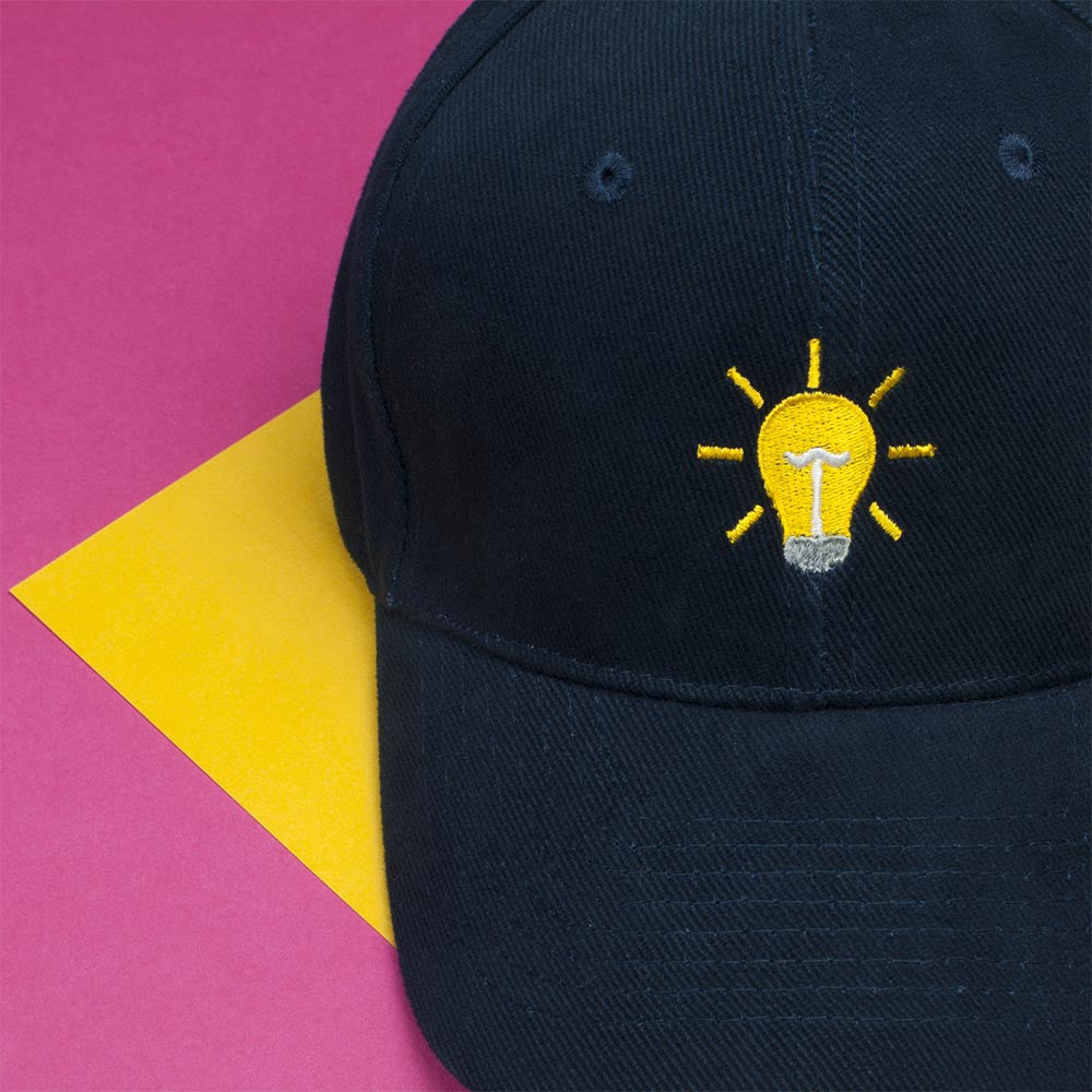 Light Bulb Embroidered Baseball Cap - Navy by Hatty Hats Embroidery - The Facts Blog Main Image