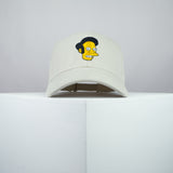 Apu Nahasapeemapetilon embroidered baseball cap beige / the simpsons / bart / marge / homer / embroidery / patch / hat / dad hat / cap / iron on patch / embroidered patch / badge / applique / embroidered / punk patches / trucker hat / snapback / caps / dad hats / baseball hat / mens hat / womens hat / embroidered hat / dad cap / embroidered cap