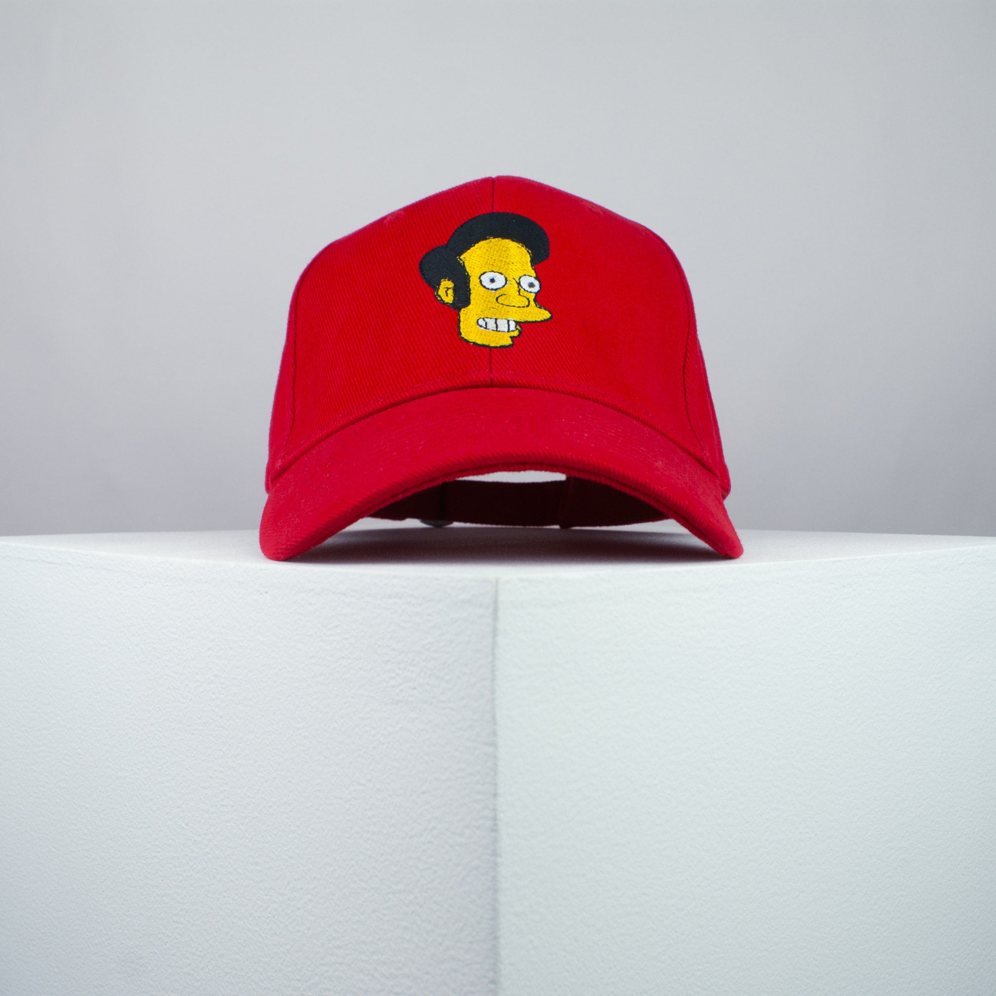 Apu Nahasapeemapetilon embroidered baseball cap red / the simpsons / bart / marge / homer / embroidery / patch / hat / dad hat / cap / iron on patch / embroidered patch / badge / applique / embroidered / punk patches / trucker hat / snapback / caps / dad hats / baseball hat / mens hat / womens hat / embroidered hat / dad cap / embroidered cap