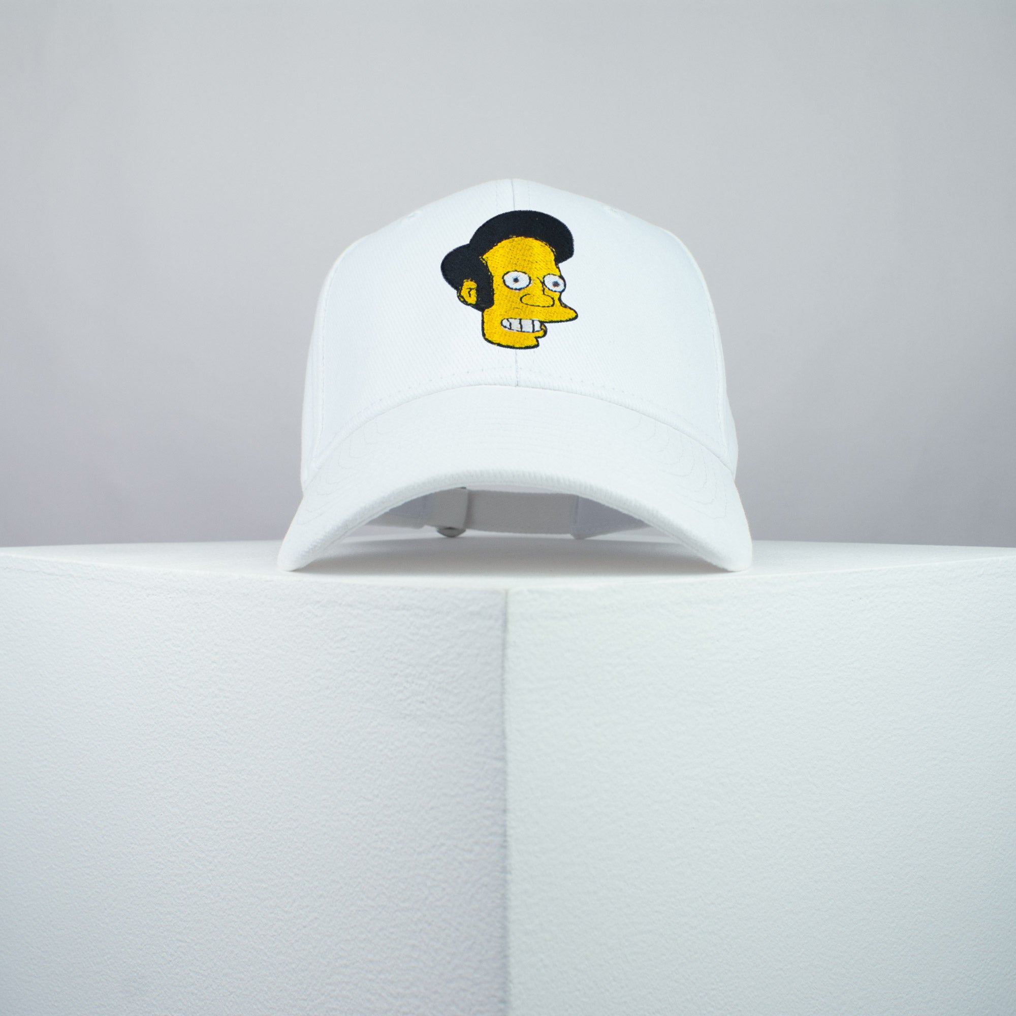 Apu Nahasapeemapetilon embroidered baseball cap white / the simpsons / bart / marge / homer / embroidery / patch / hat / dad hat / cap / iron on patch / embroidered patch / badge / applique / embroidered / punk patches / trucker hat / snapback / caps / dad hats / baseball hat / mens hat / womens hat / embroidered hat / dad cap / embroidered cap