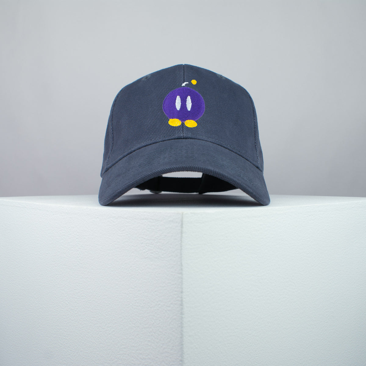 Super Mario Bob-omb embroidered baseball cap grey / mario / nintendo / gamer / gaming / embroidery / patch / hat / dad hat / cap / iron on patch / embroidered patch / badge / applique / embroidered / punk patches / trucker hat / snapback / caps / dad hats / baseball hat / mens hat / womens hat / embroidered hat / dad cap / embroidered cap