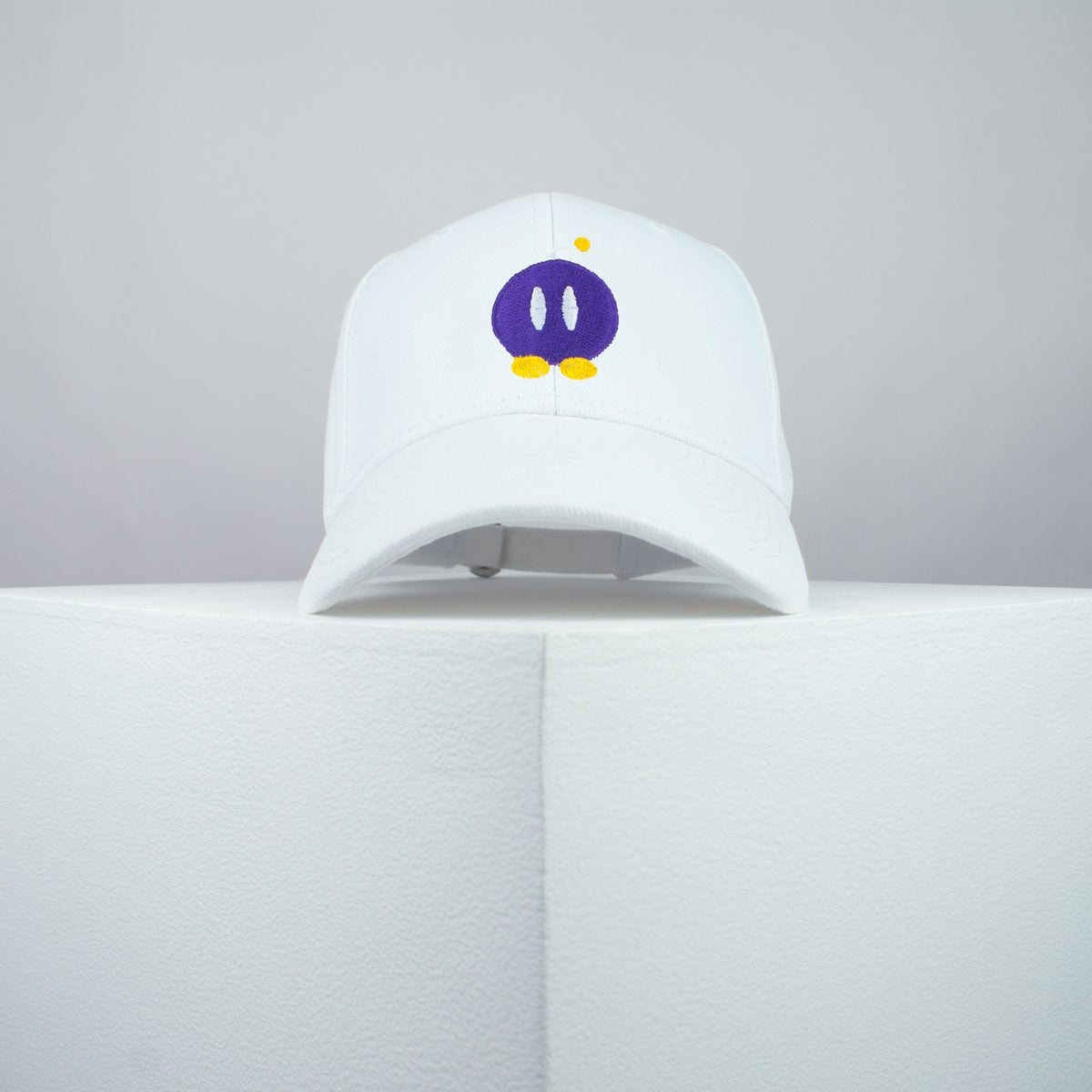 Super Mario Bob-omb embroidered baseball cap white / mario / nintendo / gamer / gaming / embroidery / patch / hat / dad hat / cap / iron on patch / embroidered patch / badge / applique / embroidered / punk patches / trucker hat / snapback / caps / dad hats / baseball hat / mens hat / womens hat / embroidered hat / dad cap / embroidered cap