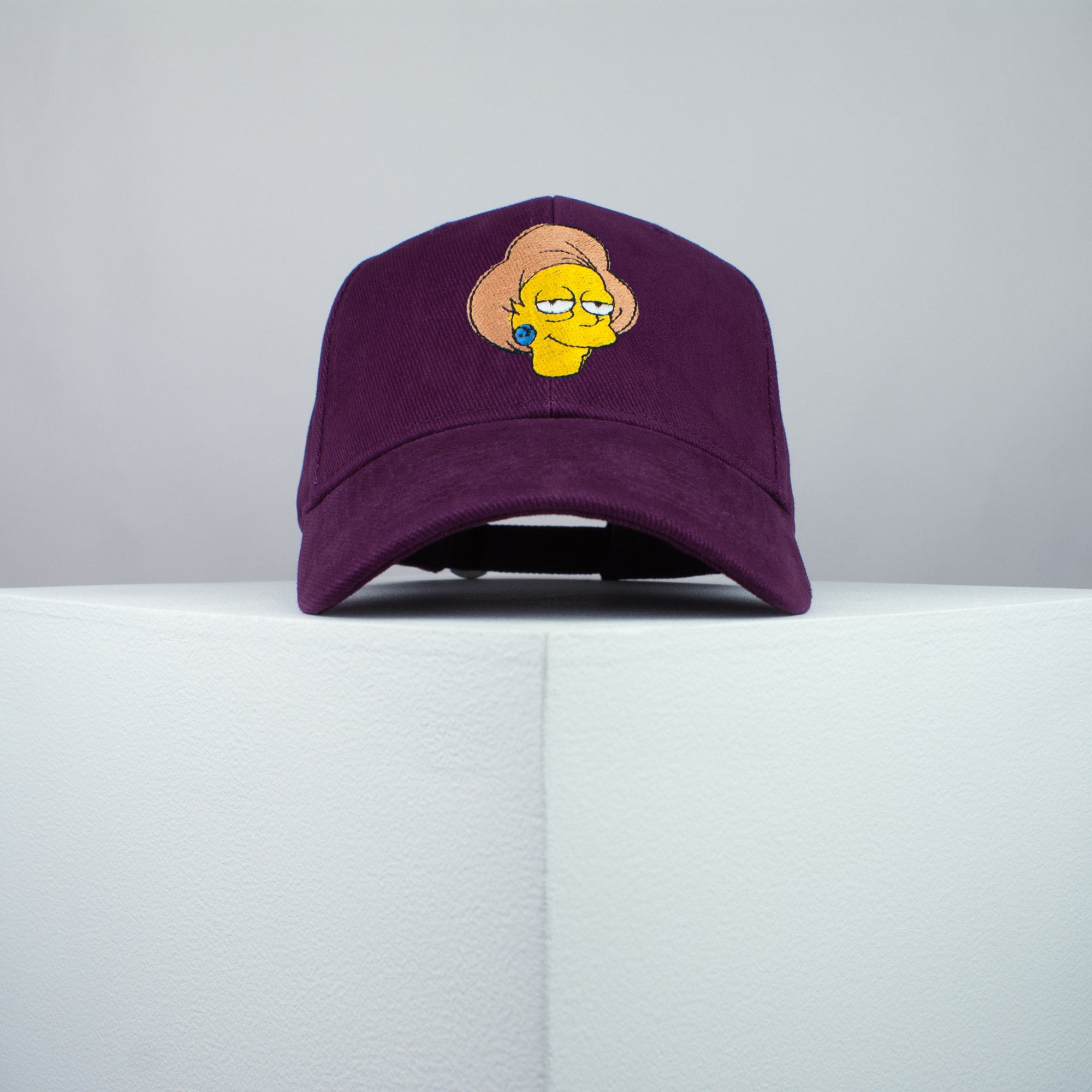 Edna Krabappel embroidered baseball cap burgundy / the simpsons / bart / marge / homer / embroidery / patch / hat / dad hat / cap / iron on patch / embroidered patch / badge / applique / embroidered / punk patches / trucker hat / snapback / caps / dad hats / baseball hat / mens hat / womens hat / embroidered hat / dad cap / embroidered cap