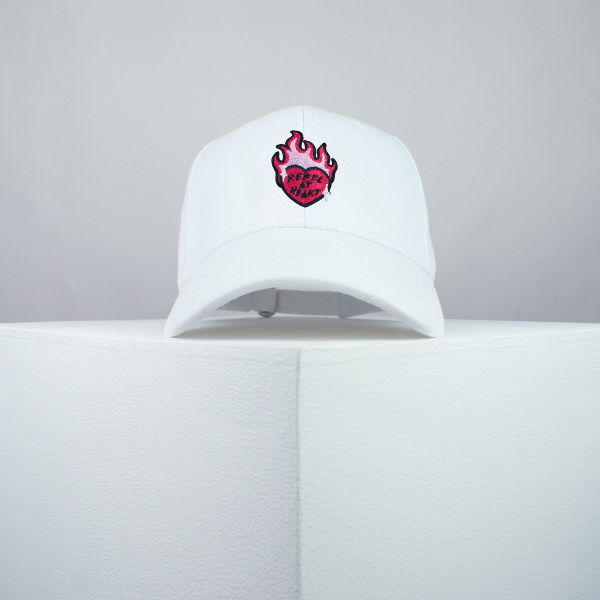 Rebel at heart embroidered baseball cap white / girl power / feminist / feminism / gift for her / embroidery / patch / hat / dad hat / cap / iron on patch / embroidered patch / badge / applique / embroidered / punk patches / trucker hat / snapback / caps / dad hats / baseball hat / mens hat / womens hat / embroidered hat / dad cap / embroidered cap