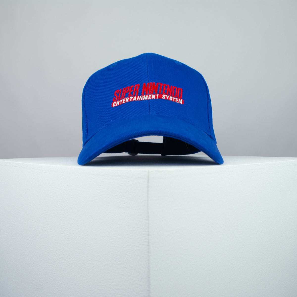 Super Nintendo embroidered baseball cap blue / gamer / gaming / SNES retro video games / embroidery / patch / hat / dad hat / cap / iron on patch / embroidered patch / badge / applique / embroidered / punk patches / trucker hat / snapback / caps / dad hats / baseball hat / mens hat / womens hat / embroidered hat / dad cap / embroidered cap