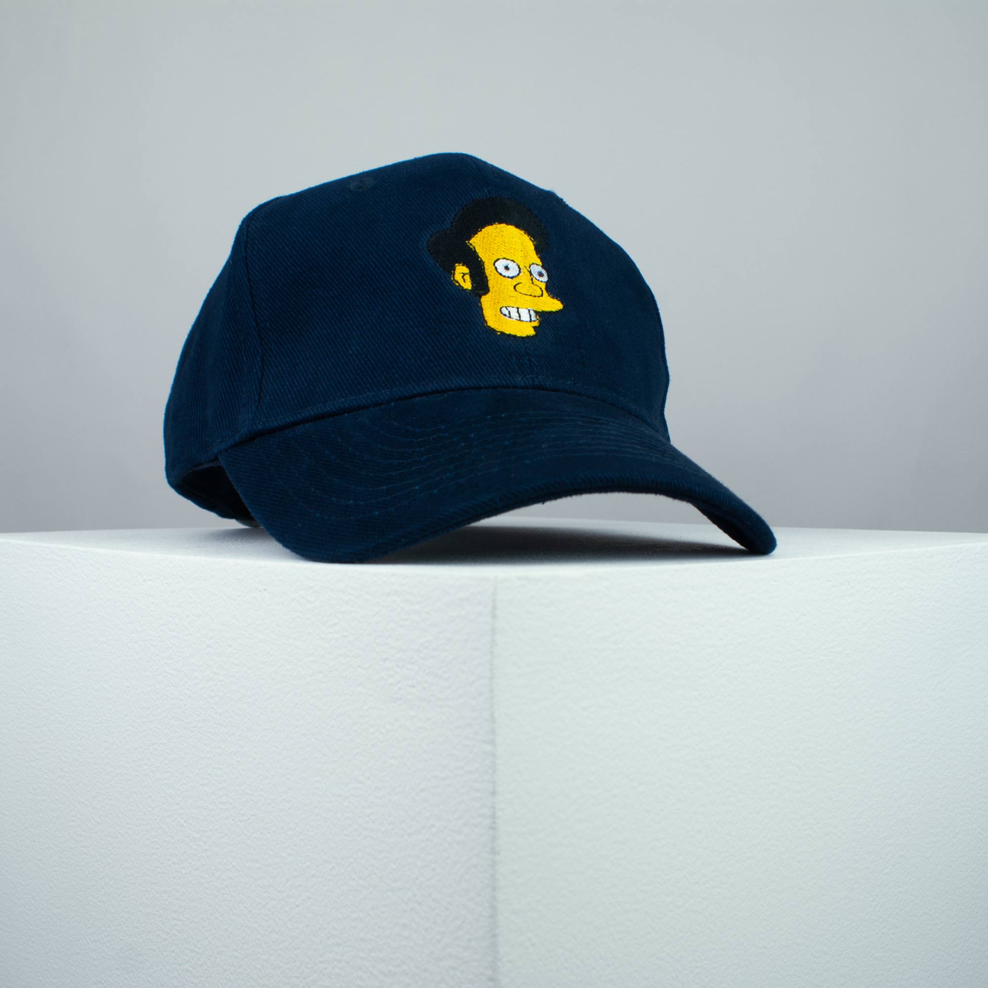 Apu Nahasapeemapetilon embroidered baseball cap (8 hat colours) / the simpsons / bart / marge / homer / embroidery / patch / hat / dad hat / cap / iron on patch / embroidered patch / badge / applique / embroidered / punk patches / trucker hat / snapback / caps / dad hats / baseball hat / mens hat / womens hat / embroidered hat / dad cap / embroidered cap 1