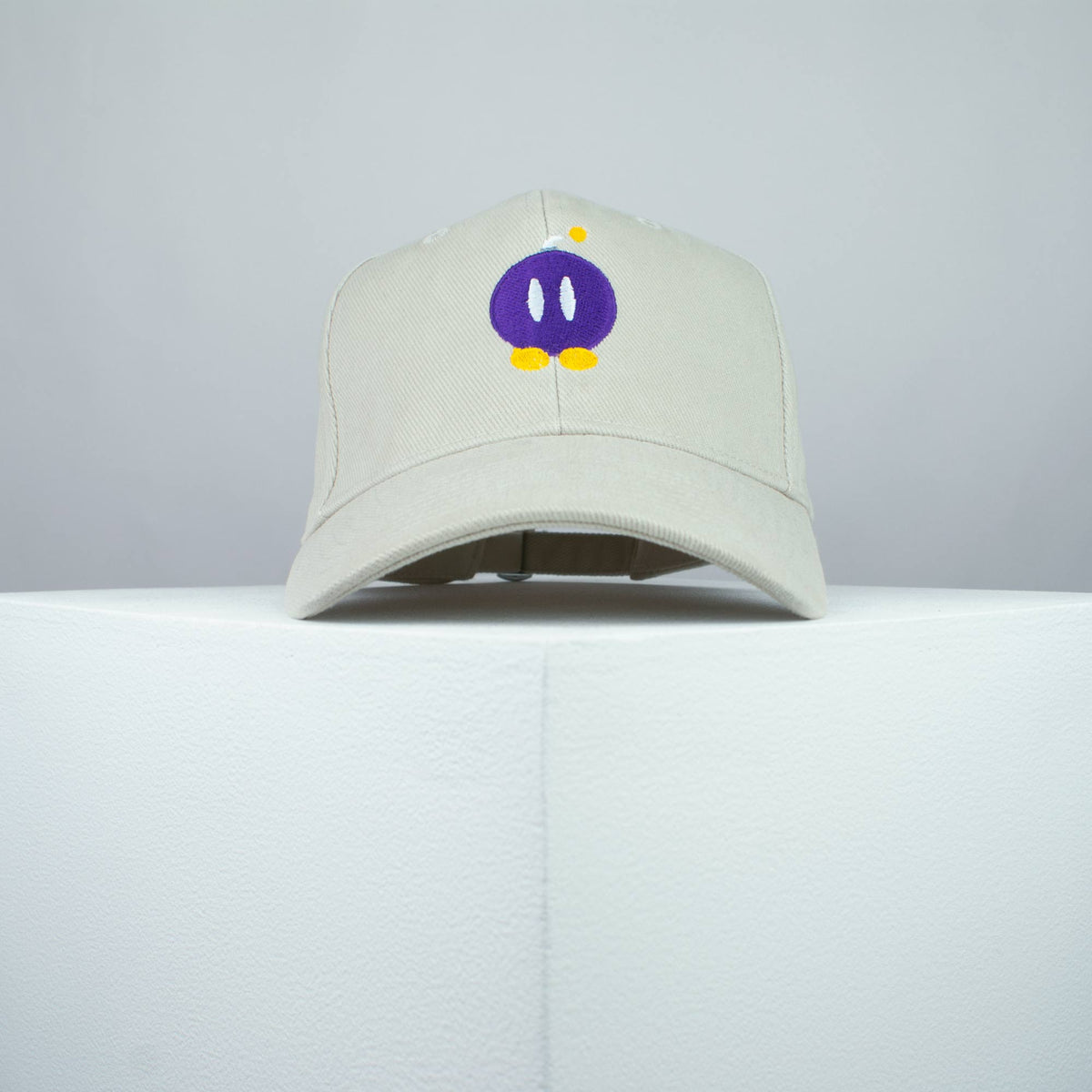Super Mario Bob-omb embroidered baseball cap beige / mario / nintendo / gamer / gaming / embroidery / patch / hat / dad hat / cap / iron on patch / embroidered patch / badge / applique / embroidered / punk patches / trucker hat / snapback / caps / dad hats / baseball hat / mens hat / womens hat / embroidered hat / dad cap / embroidered cap