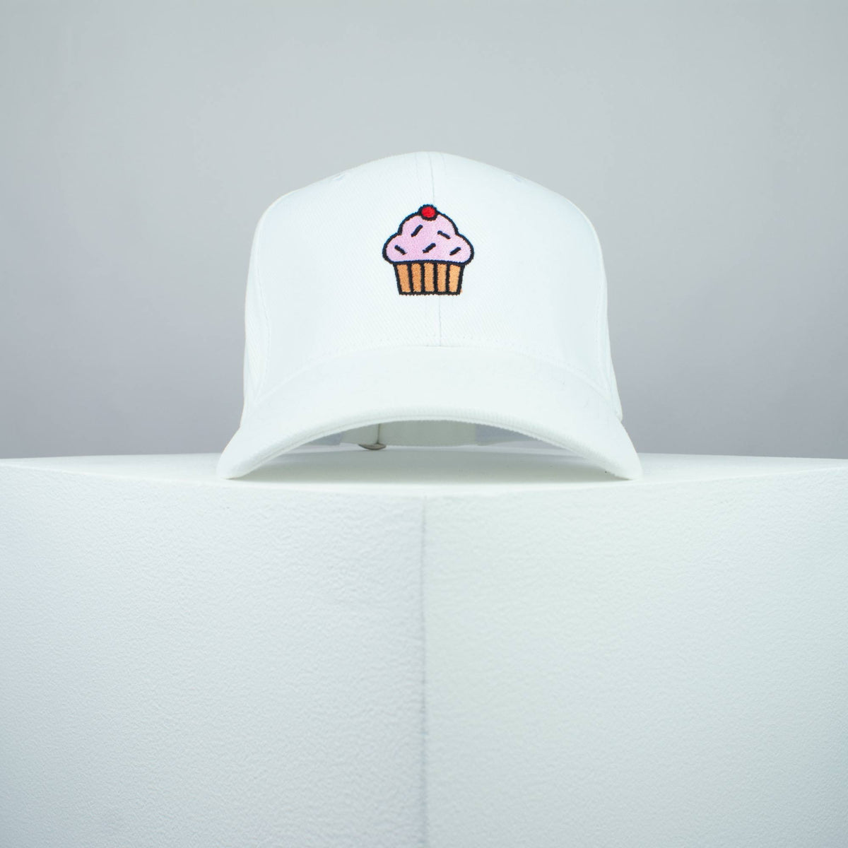 Cupcake embroidered baseball cap white / cake / gift / food / embroidery / patch / hat / dad hat / cap / iron on patch / embroidered patch / badge / applique / embroidered / punk patches / trucker hat / snapback / caps / dad hats / baseball hat / mens hat / womens hat / embroidered hat / dad cap / embroidered cap
