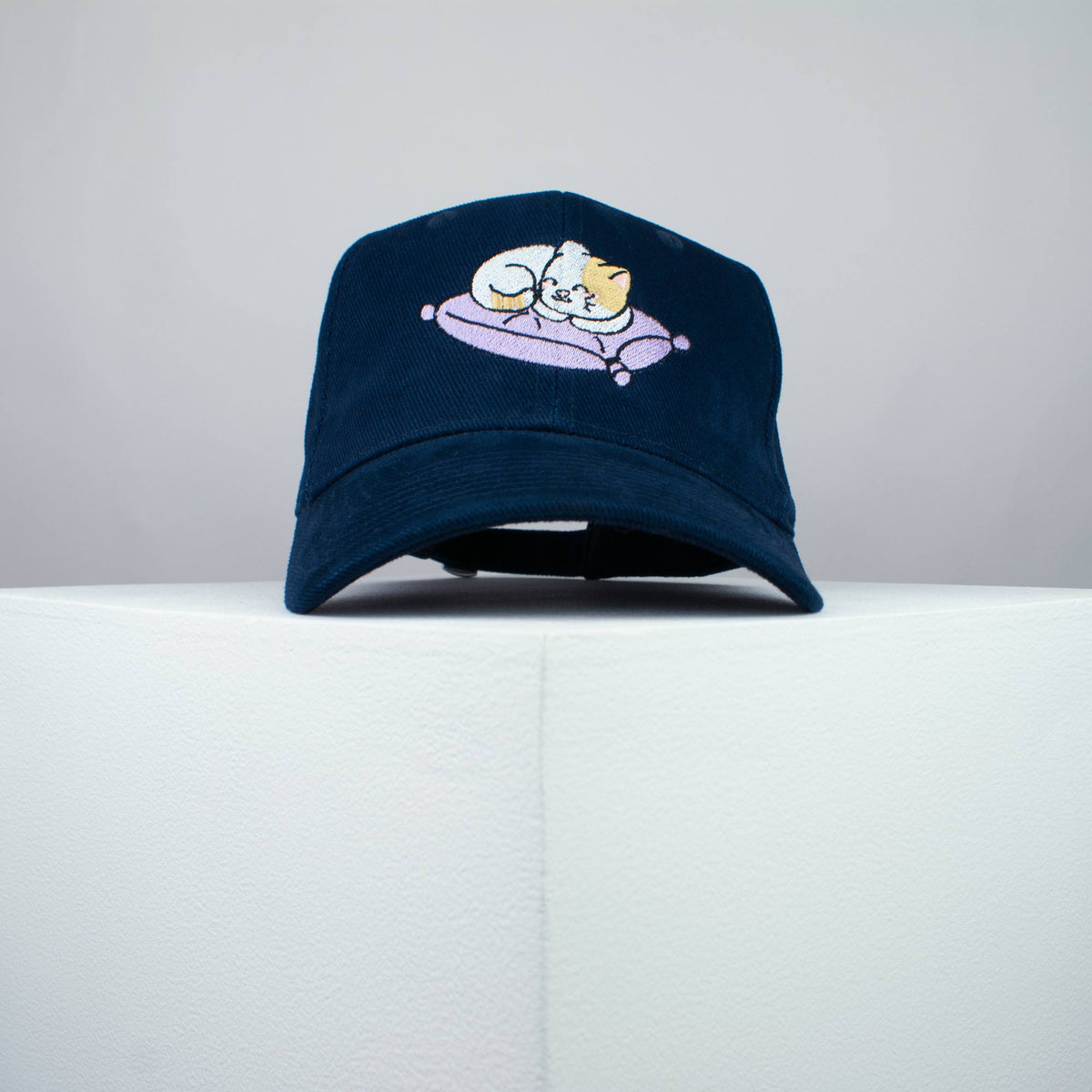 Cute sleeping kitty embroidered baseball cap navy / cat / kitten / pillow / dog / embroidery / patch / hat / dad hat / cap / iron on patch / embroidered patch / badge / applique / embroidered / punk patches / trucker hat / snapback / caps / dad hats / baseball hat / mens hat / womens hat / embroidered hat / dad cap / embroidered cap