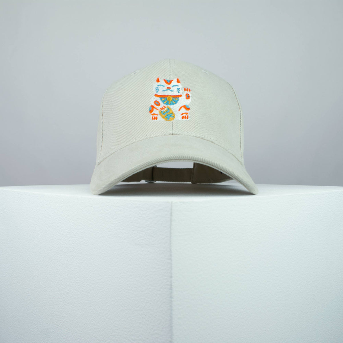Waving cat embroidered baseball cap beige / japan / japanese / cat / cute / streetwear / embroidery / patch / dad / hat / cap / clothing // Hatty Hats / iron on patch / dad hat embroidered patch / badge / applique / embroidered / punk patches / trucker hat / snapback / caps / dad hats / baseball hat / mens hat / womens hat / embroidered hat / dad cap / embroidered cap